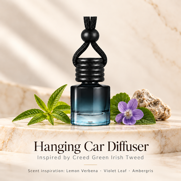Hanging car diffuser inspired by Creed Green Irish Tweed, with scent illustrations on warm ivory stone