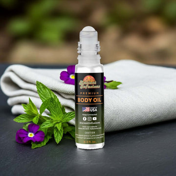 Creed Green Irish Tweed Inspired Body Oil with aromatic notes of lemon verbena, violet leaf, and sandalwood in roll-on bottle.