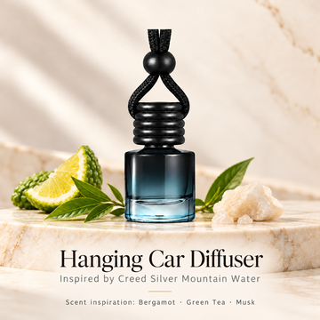 Hanging car diffuser inspired by Creed Silver Mountain Water, with scent illustrations on warm ivory stone