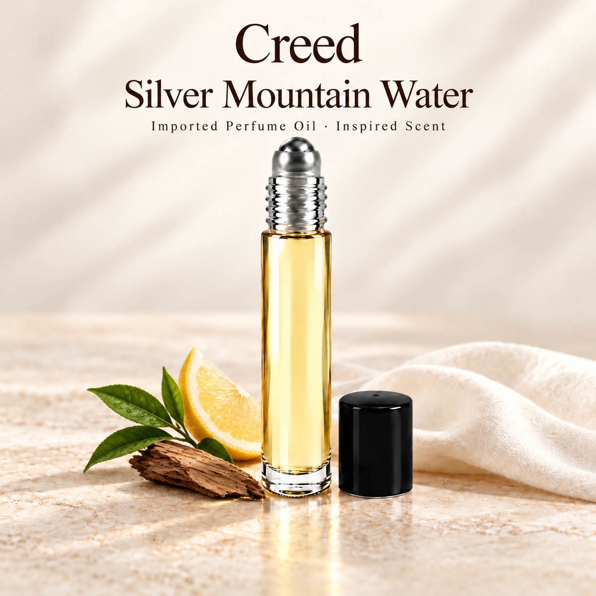 Creed Silver Mountain Water Perfume Oil with minimal fragrance note accents on soft ivory