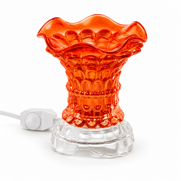 Orange crystal glass electric fragrance warmer with matching scalloped glass bowl and clear base