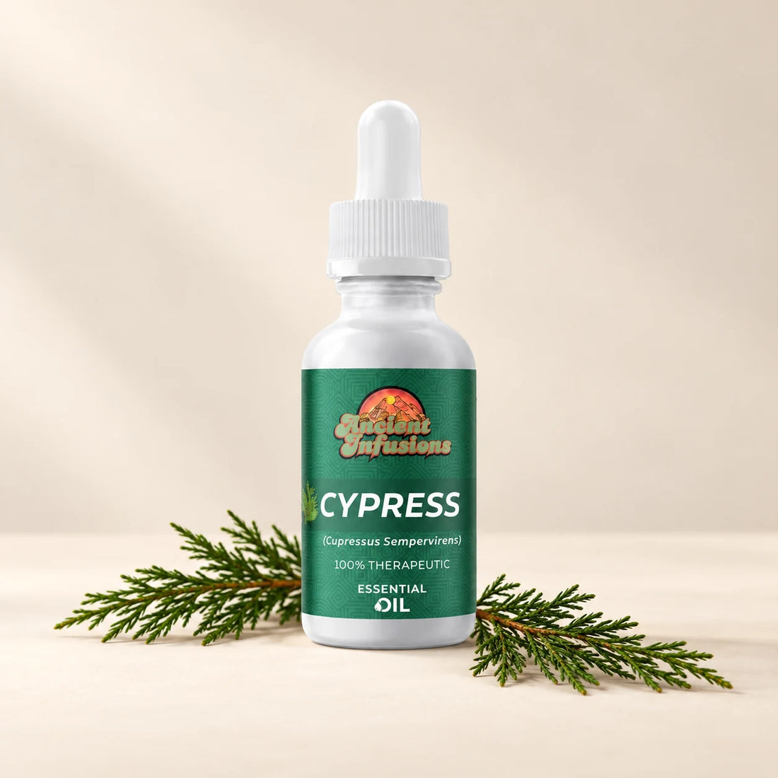 Ancient Infusions Cypress Essential Oil bottle with botanicals on a soft ivory background.