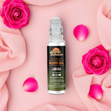 Dior Miss Dior Inspired Body Oil Roll-On with floral elements showcasing premium fragrance, highlighted by pink rose petals.