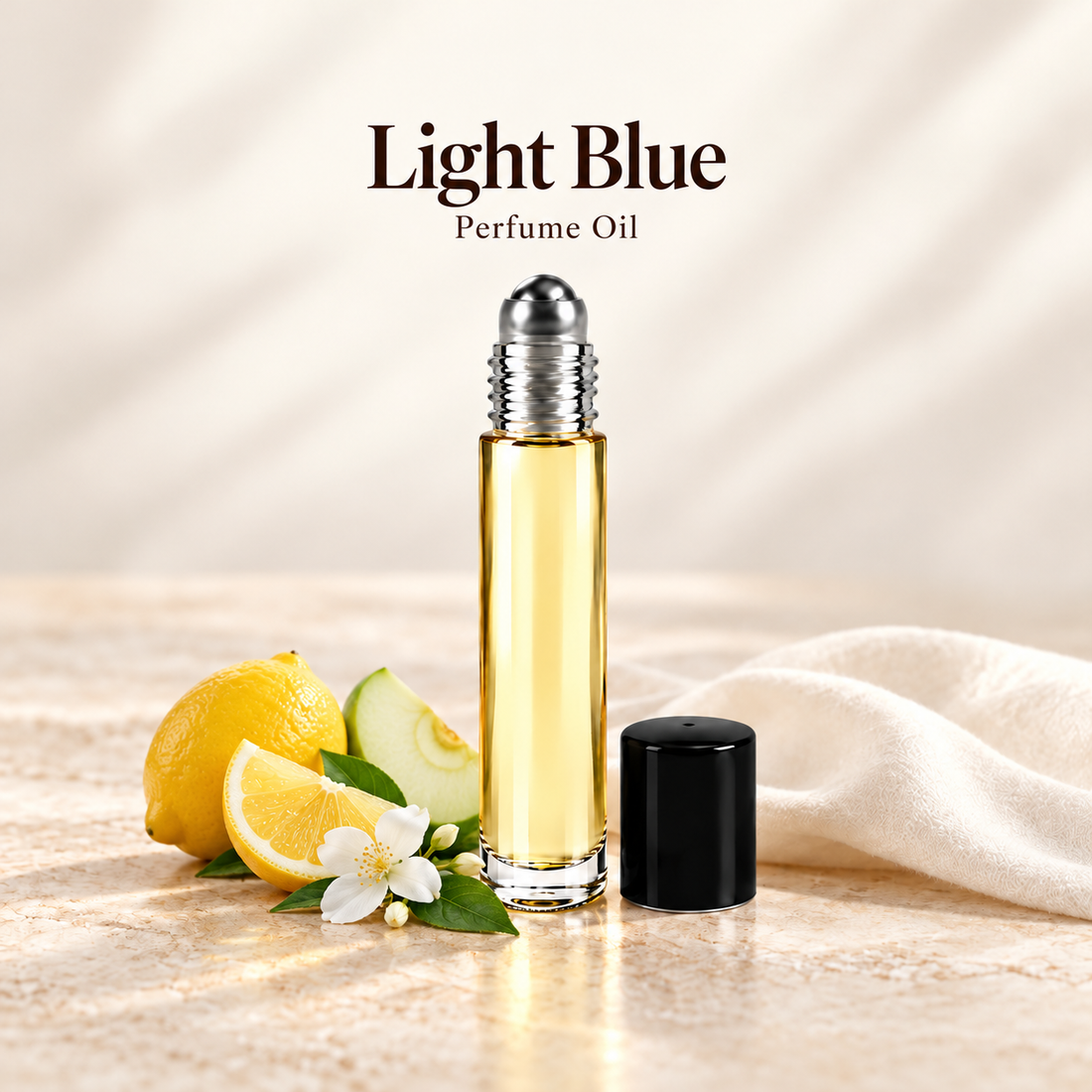 Dolce & Gabbana Light Blue Perfume Oil with simple scent note accents on soft ivory