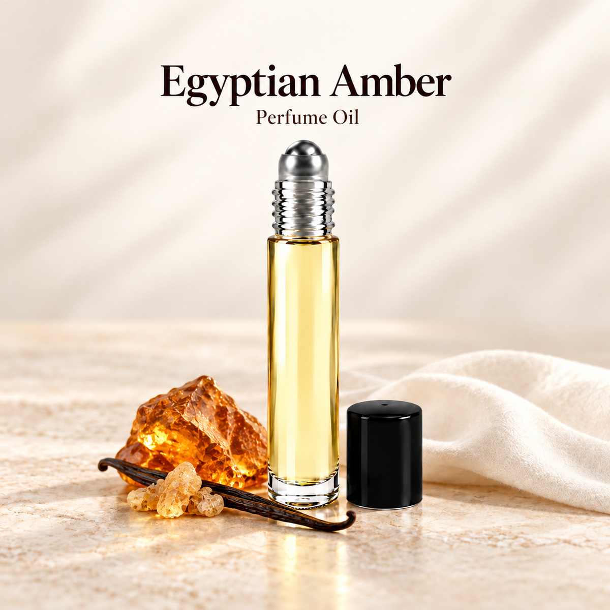 Egyptian Amber Perfume Oil with simple scent note accents on soft ivory