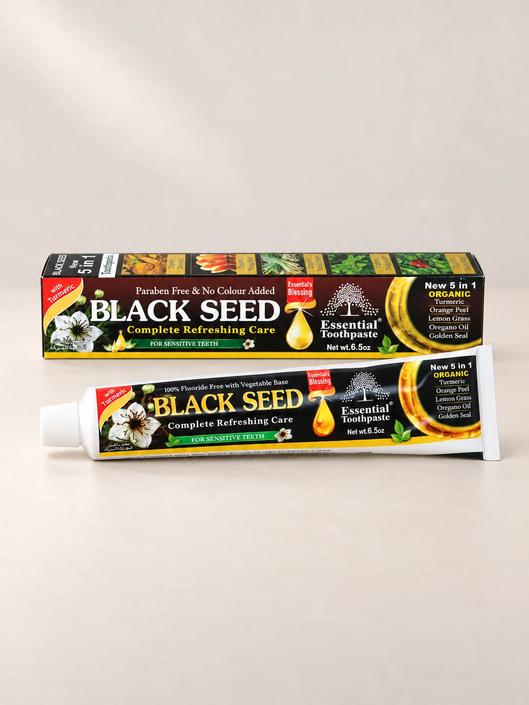 Essential Palace Black Seed Toothpaste 5-in-1 fluoride-free toothpaste tube and box on a pale warm greige background.