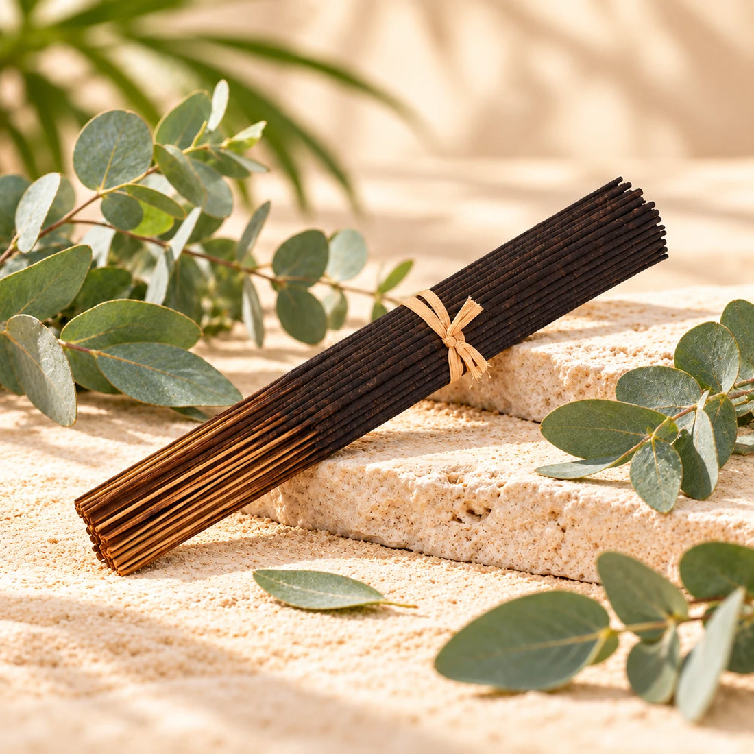 Eucalyptus Incense Sticks on cream stone.