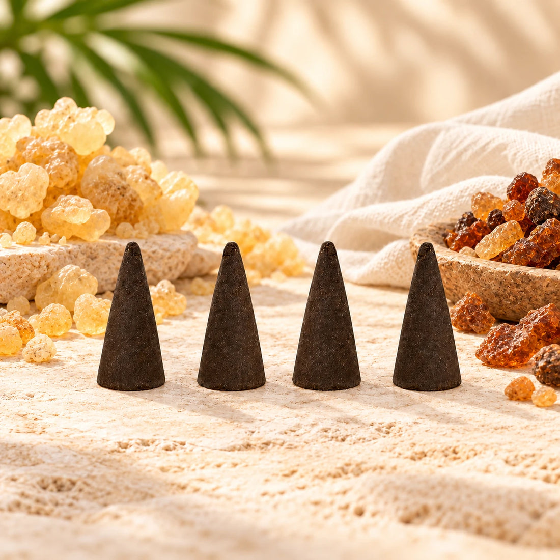 Frankincense and Myrrh Incense Cones on cream stone.