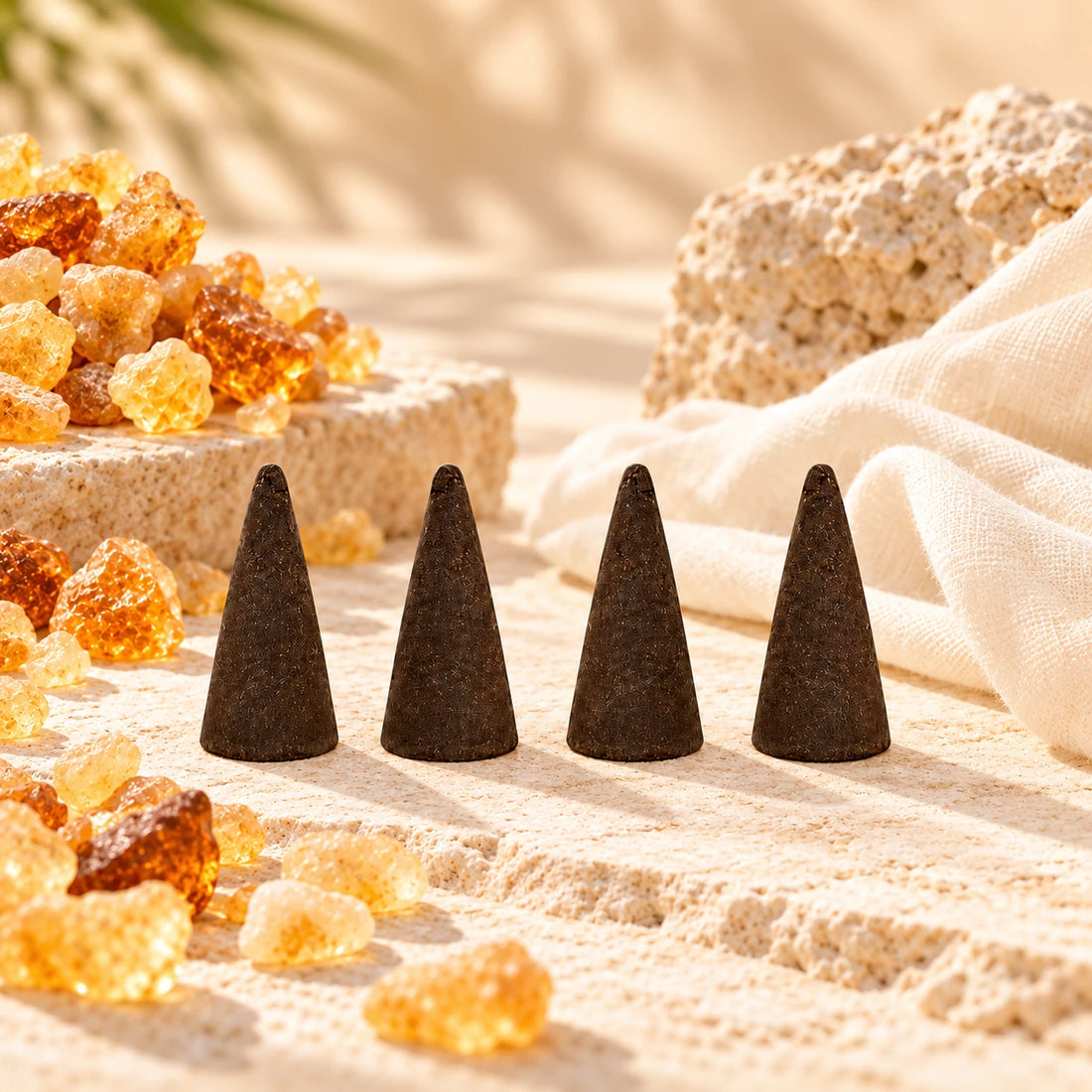 Frankincense Incense Cones on cream stone.