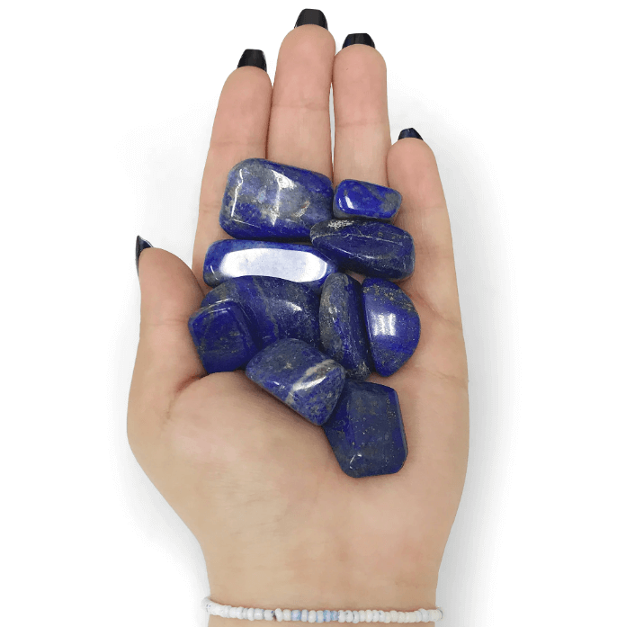 Polished lapis lazuli tumbled stones showcasing their deep blue hues, spiritual meaning, and healing benefits.