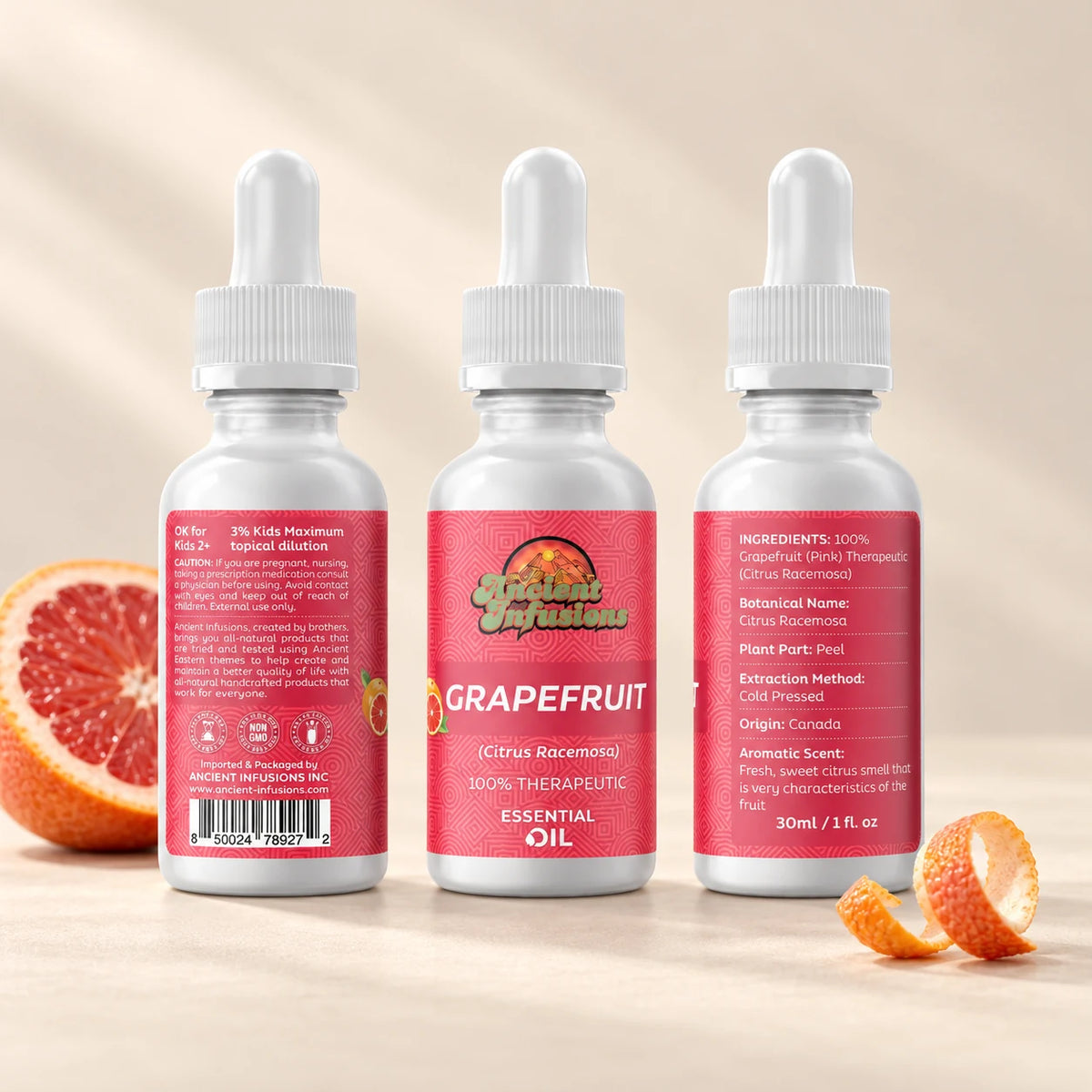 Ancient Infusions Grapefruit Essential Oil front and side label views on an ivory background.