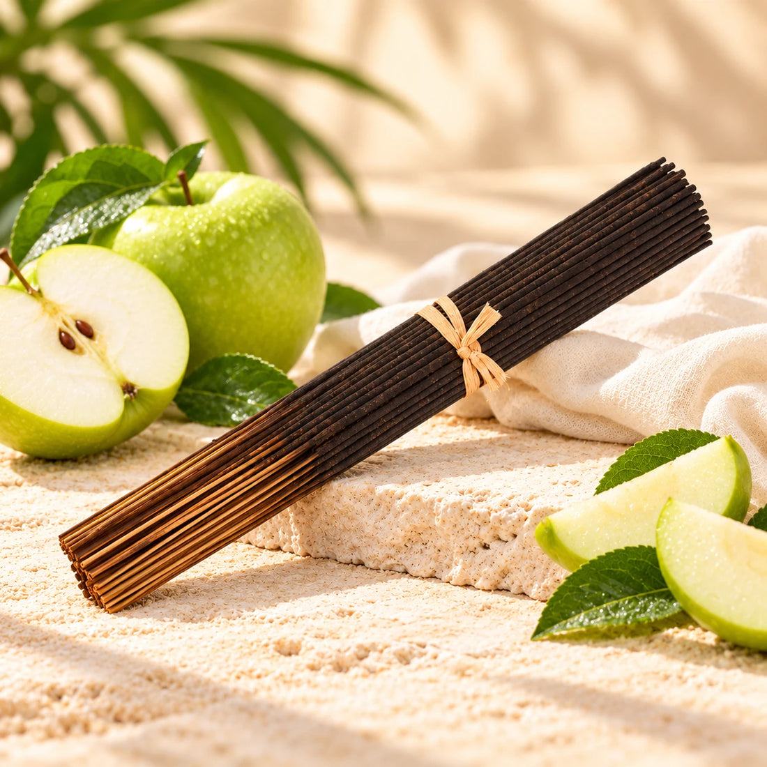 Green Apple Incense Sticks on cream stone.