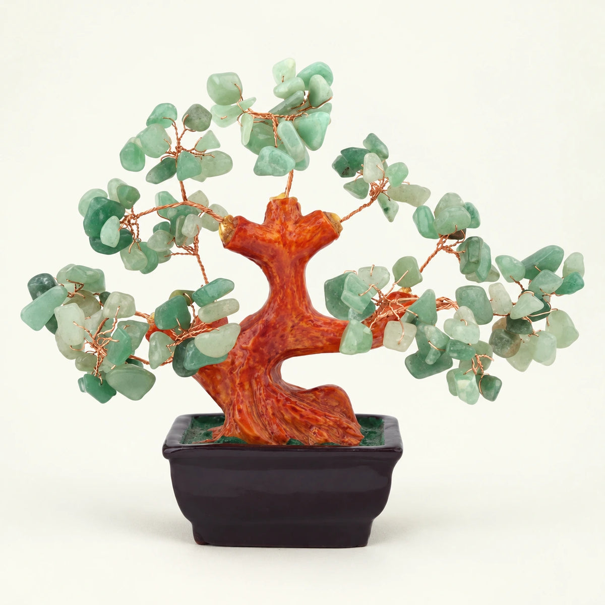 Green Aventurine Bonsai Crystal Tree on a soft ivory background; view 1.