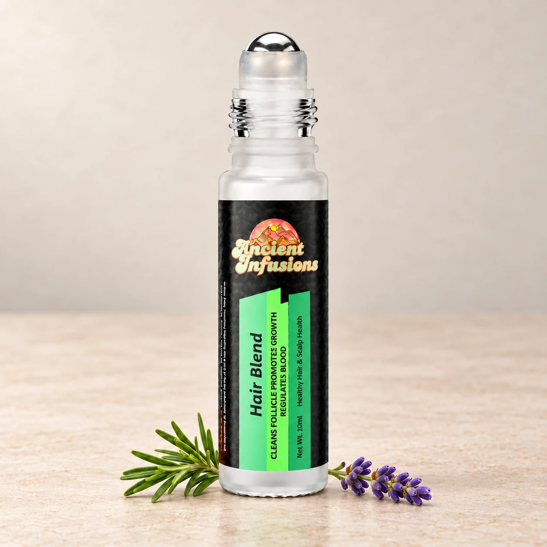 Ancient Infusions Hair Herbal Remedy Oil Nourish & Revive single roller bottle with botanical accents on a soft ivory stone background.
