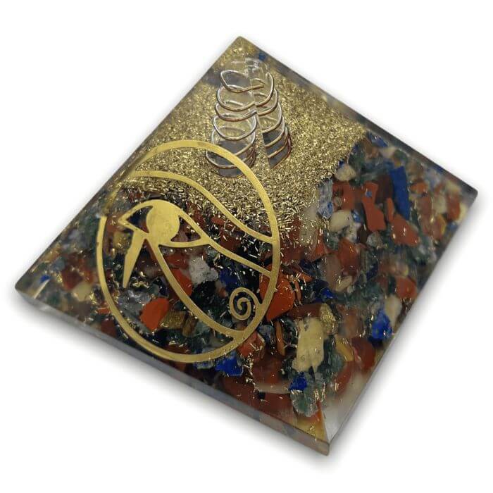 7 Chakra Orgone Pyramid with vibrant crystal layers for energy alignment.