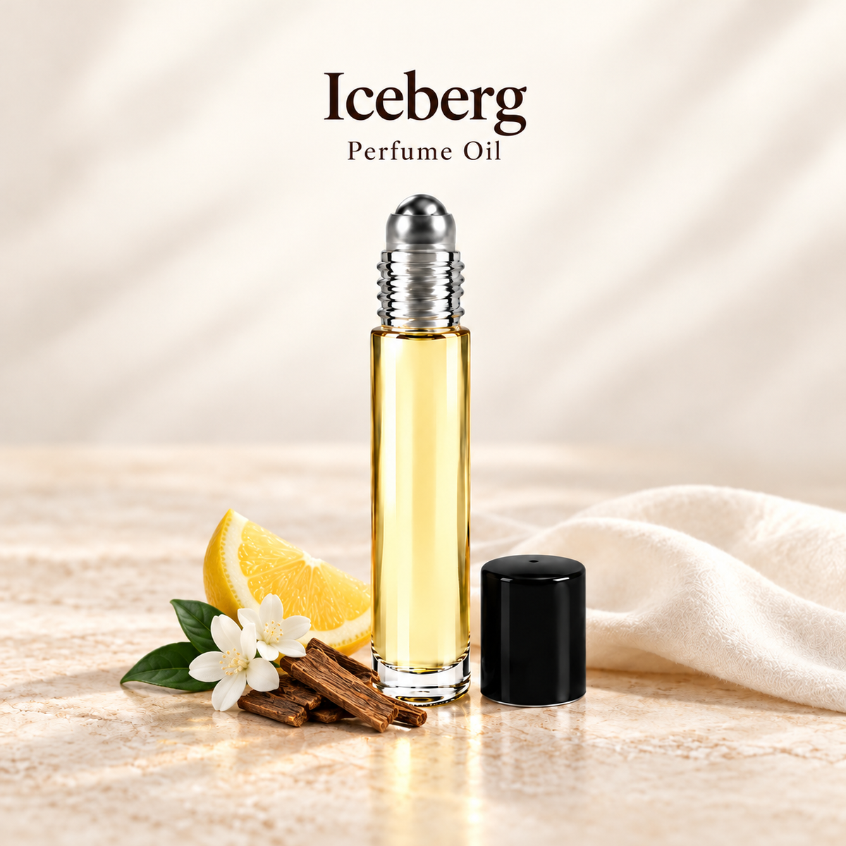 Iceberg Perfume Oil with simple scent note accents on soft ivory
