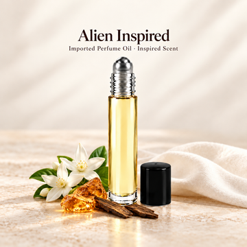 Imported Alien Inspired Perfume Oil with minimal fragrance note accents on soft ivory