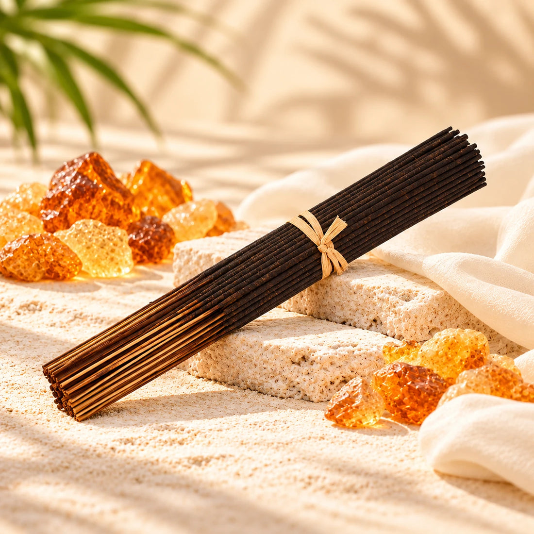 Imported Golden Sand Incense Sticks on cream stone.