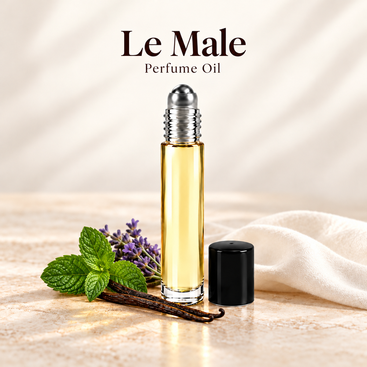 Jean Paul Gaultier Le Male Perfume Oil with simple scent note accents on soft ivory