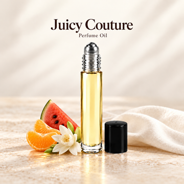 Juicy Couture Perfume Oil with simple scent note accents on soft ivory