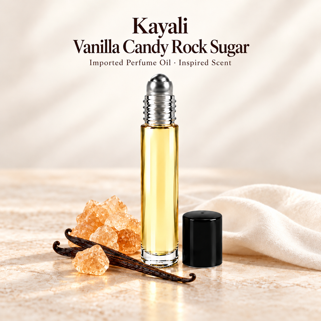 Kayali Vanilla Candy Rock Sugar Perfume Oil with minimal scent note accents on soft ivory