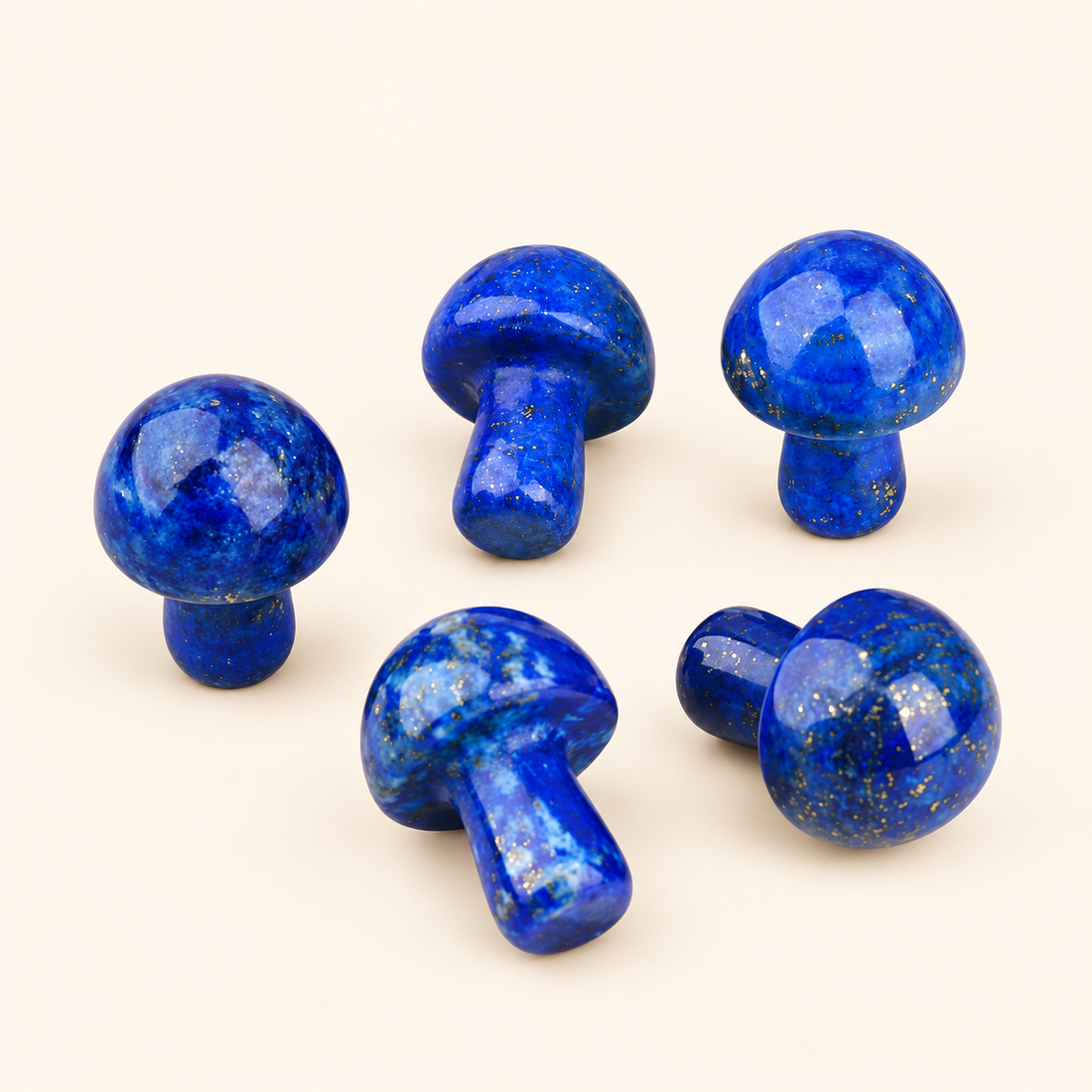 Lapis Lazuli Carved Mushroom with deep blue tones on a soft ivory background