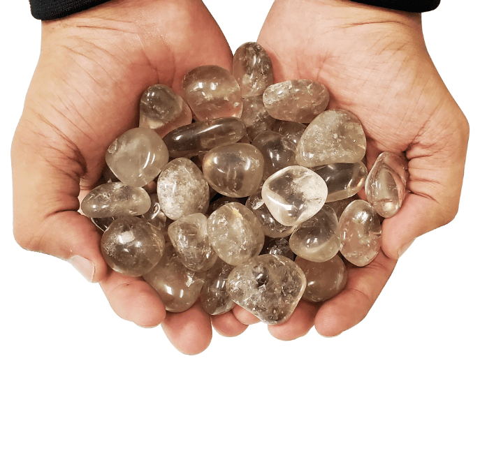 Genuine smoky quartz tumble stones showcasing their natural healing properties and spiritual meaning.