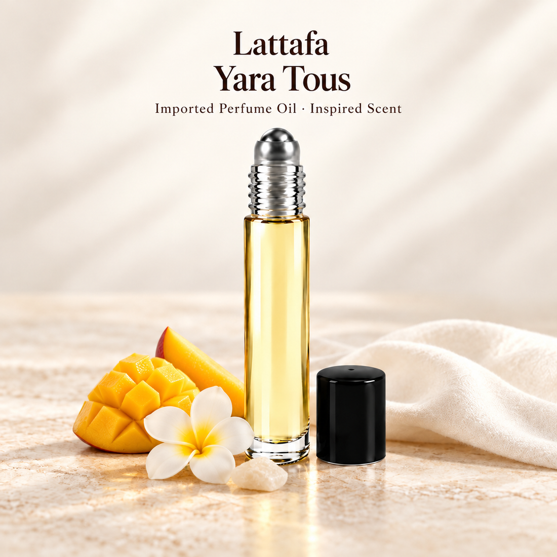 Lattafa Yara Tous Perfume Oil with minimal scent note accents on soft ivory
