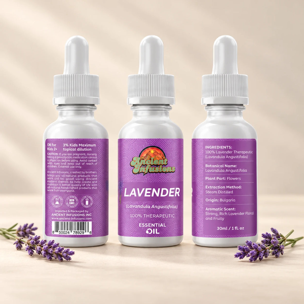 Ancient Infusions Lavender Essential Oil front and side label views on an ivory background.