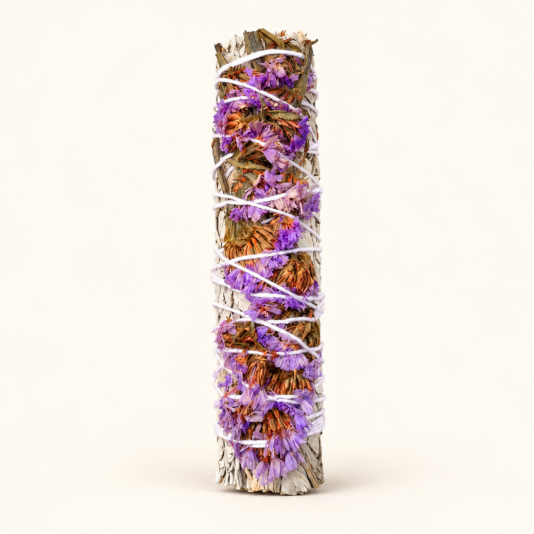 Lavender Native White Sage Smudge Stick 6 inch isolated on a soft warm ivory background