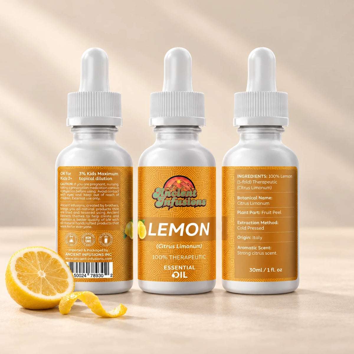 Ancient Infusions Lemon Essential Oil front and side label views on an ivory background.