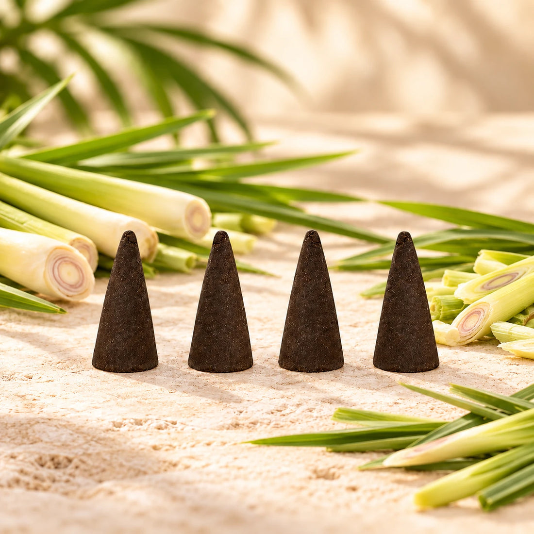 Lemongrass Incense Cones on cream stone.