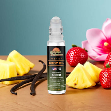 Lick Me All Over Body Oil bottle surrounded by fruits and flowers, highlighting its flirty and fruity-floral fragrance.