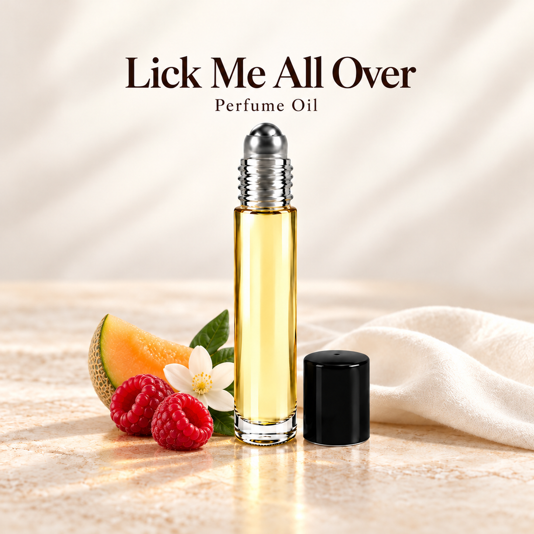Lick Me All Over Perfume Oil with simple scent note accents on soft ivory