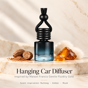 Hanging car diffuser inspired by Maison Francis Gentle Fluidity Gold, with scent illustrations on warm ivory stone