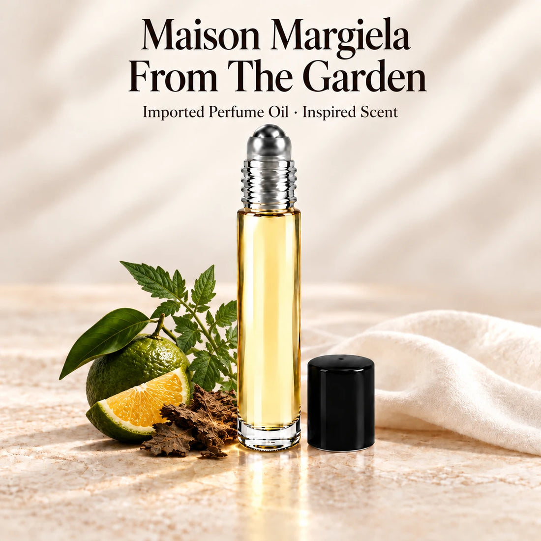 Maison Margiela From The Garden Perfume Oil in a slim glass roll-on bottle with a silver roller and black cap on an ivory stone surface.