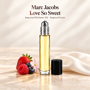 Marc Jacobs Love So Sweet Perfume Oil with minimal scent note accents on soft ivory