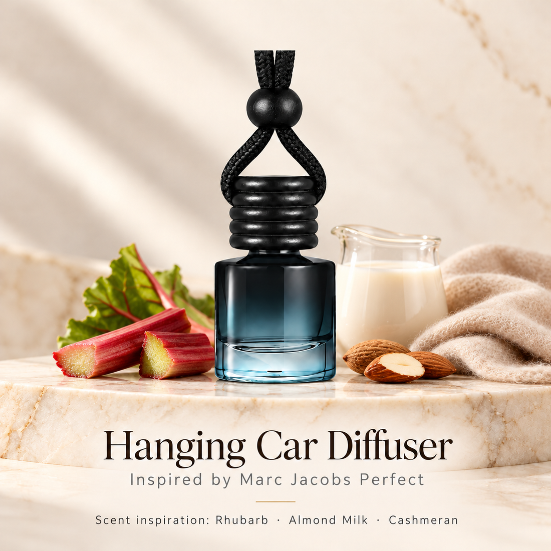Hanging car diffuser inspired by Marc Jacobs Perfect, with scent illustrations on warm ivory stone