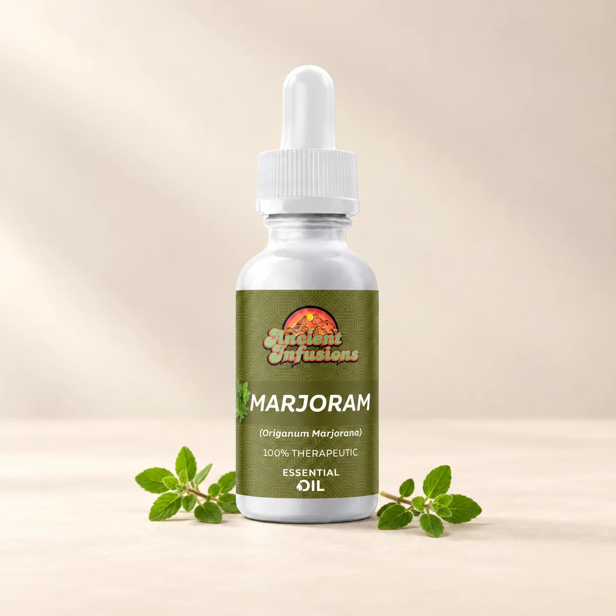 Ancient Infusions Marjoram Essential Oil bottle with botanicals on a soft ivory background.