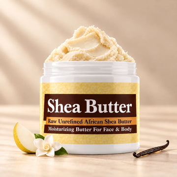 Mary J Blige Shea Butter in an open white jar with textured ivory shea butter and simple scent accents on a soft cream background.