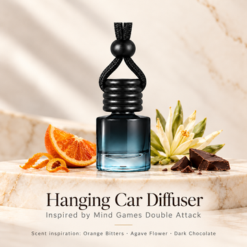 Hanging car diffuser inspired by Mind Games Double Attack, with scent illustrations on warm ivory stone
