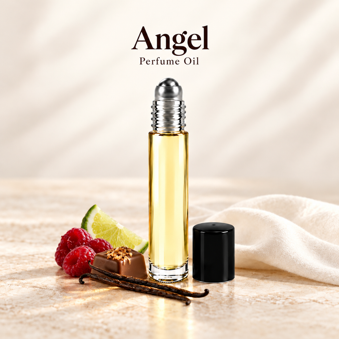 Mugler Angel Perfume Oil with simple scent note accents on soft ivory