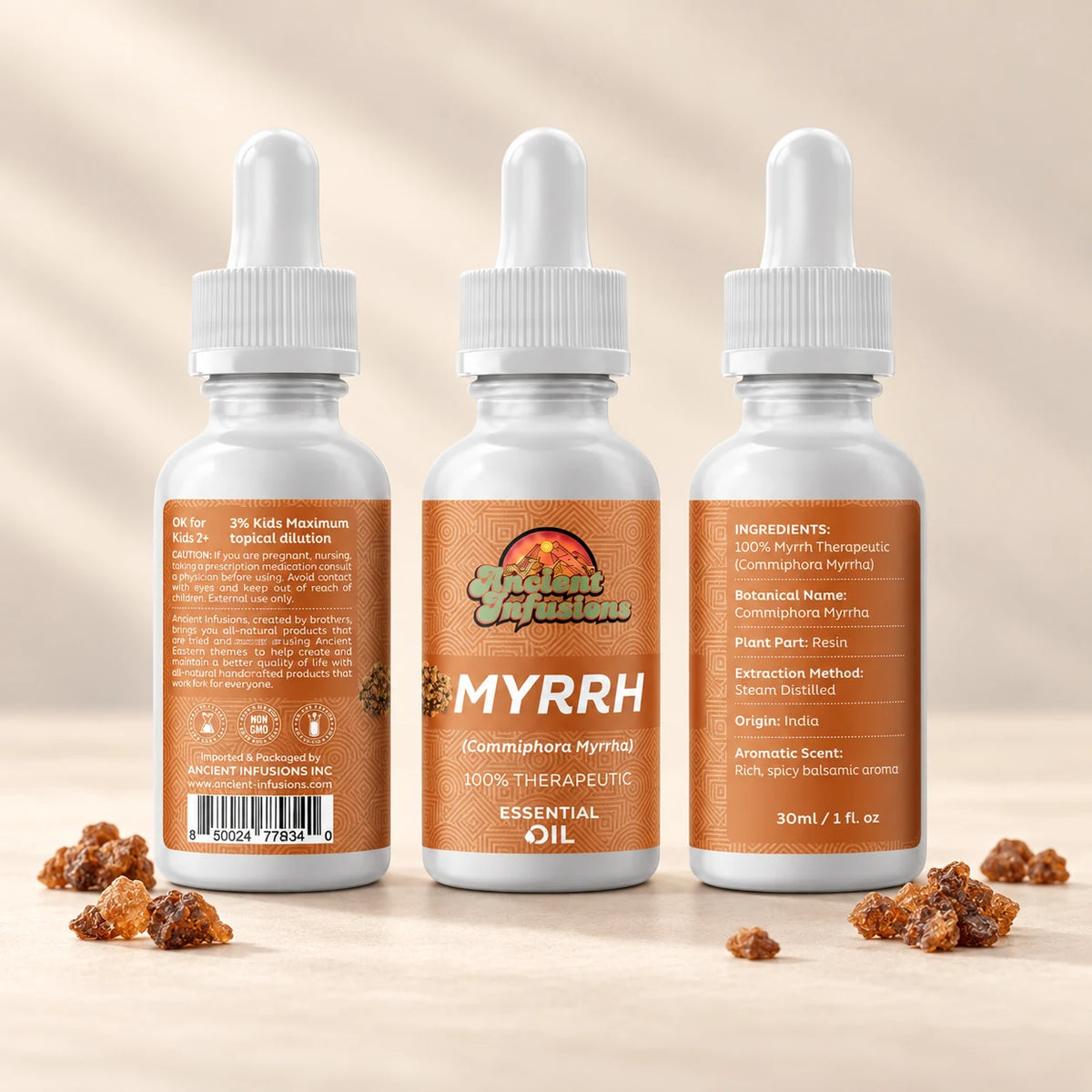 Ancient Infusions Myrrh Essential Oil front and side label views on an ivory background.