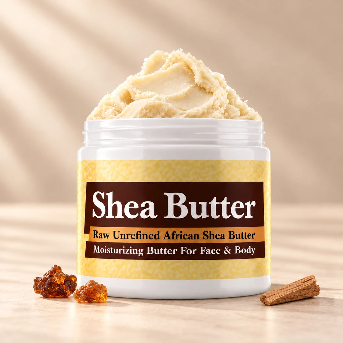 Myrrh Shea Butter in an open white jar with textured ivory shea butter and simple scent accents on a soft cream background.