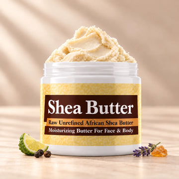 Mystery Man Shea Butter in an open white jar with textured ivory shea butter and subtle scent accents on a soft cream background.