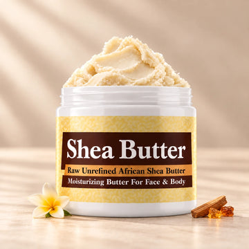 Nag Champa Shea Butter in an open white jar with textured ivory shea butter and simple scent accents on a soft cream background.