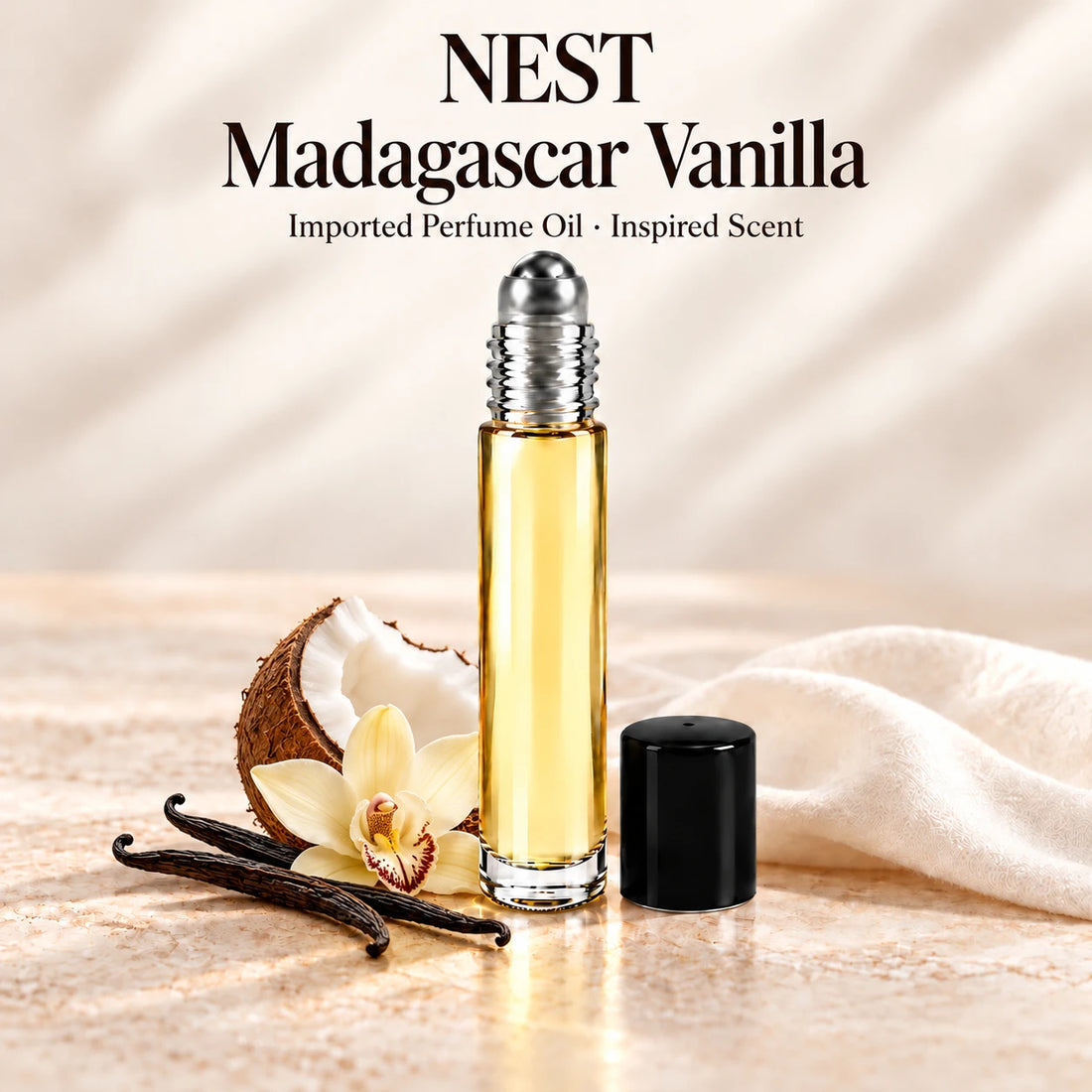 NEST Madagascar Vanilla Perfume Oil in a slim glass roll-on bottle with a silver roller and black cap on an ivory stone surface.