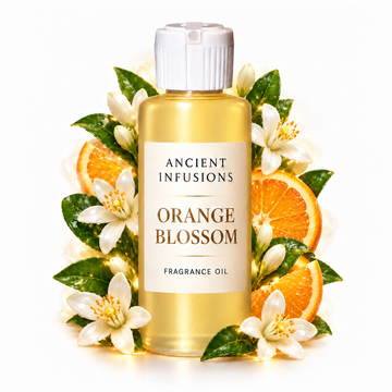 Orange Blossom Fragrance Oil by Ancient Infusions in a golden oil bottle with scent artwork