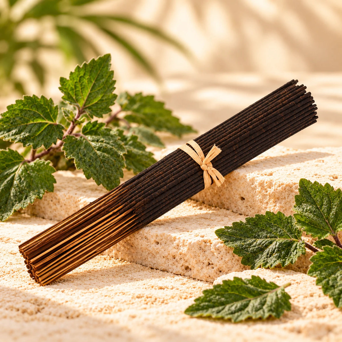 Patchouli Incense Sticks on cream stone.