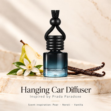Hanging car diffuser inspired by Prada Paradoxe, with scent illustrations on warm ivory stone